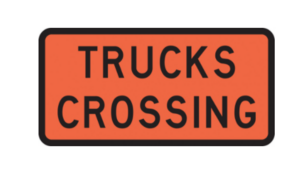 Trucks Crossing Sign